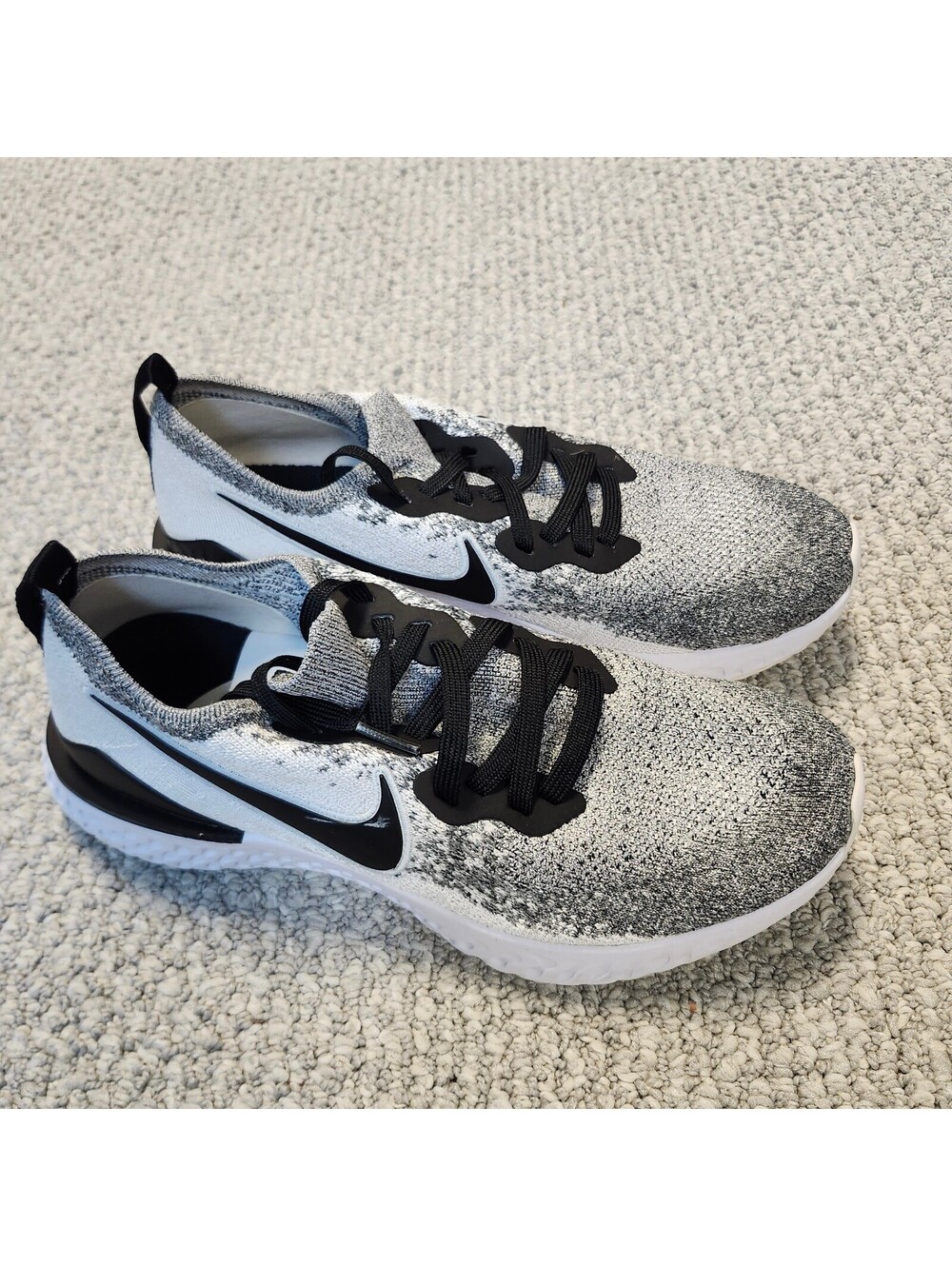Nike Women’s Black and White Knit Running Sneakers